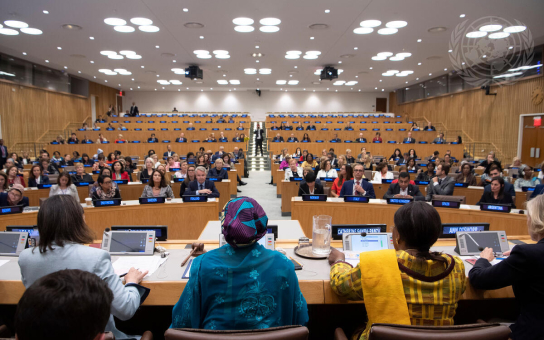 Big assembly of women in official building